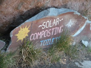 Composting sign by hut