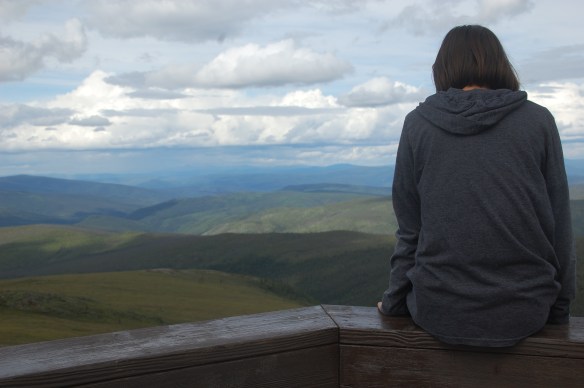 Henna in thought on top of the world